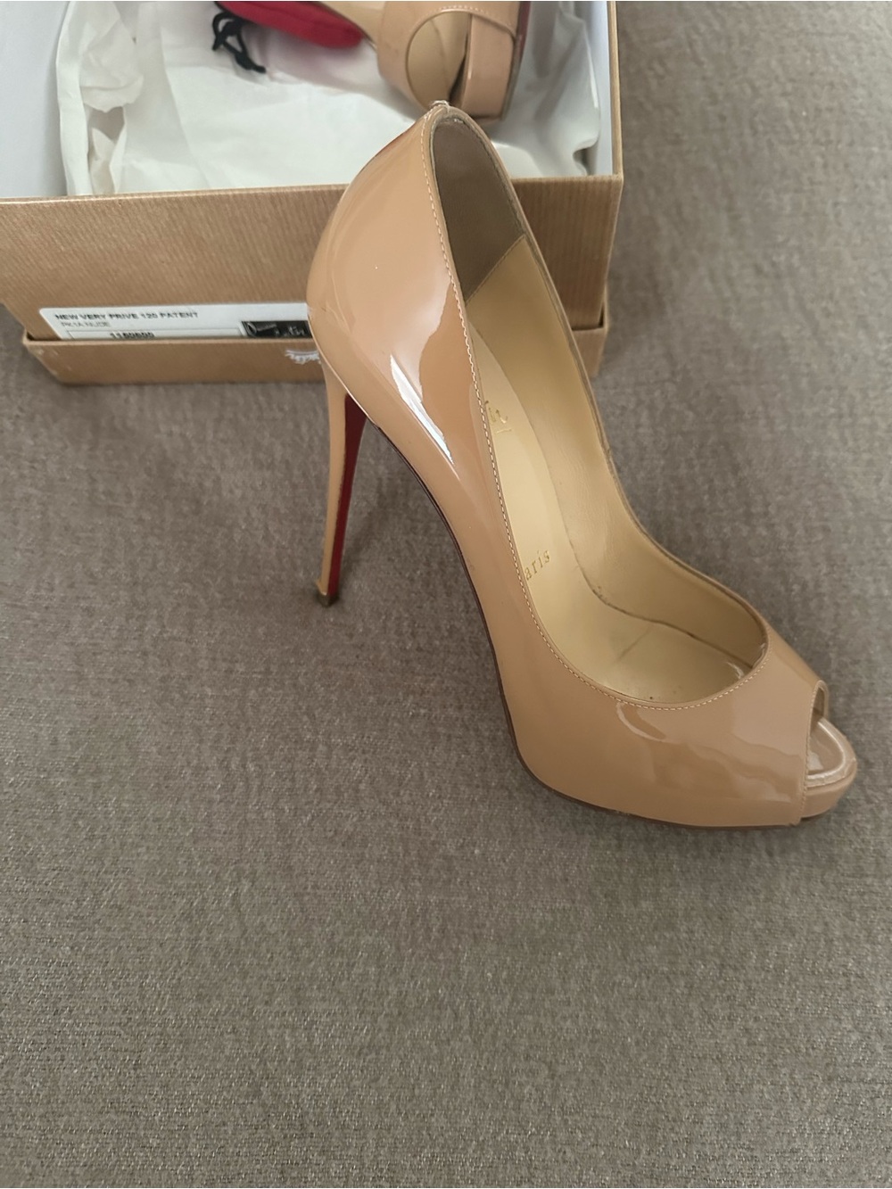 Christian Louboutin Prive 120
Nude Patent Pumps with Signature Red Sole